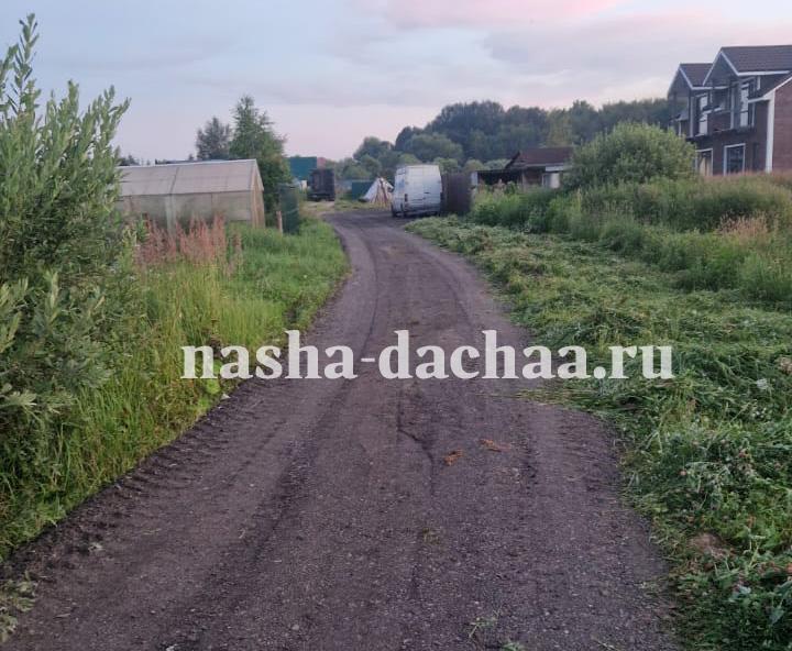 Отсыпка дороги асфальтовой крошки в д.Папино, Калужской области